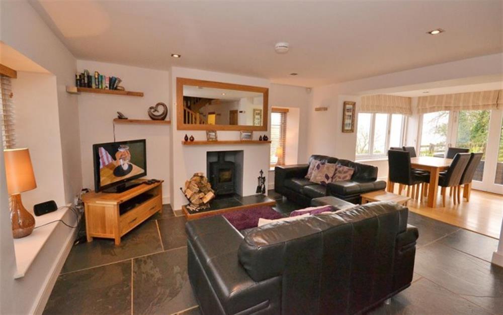 Stoke cottage has a log burner and open plan ground floor at Revelstoke Combined in Noss Mayo