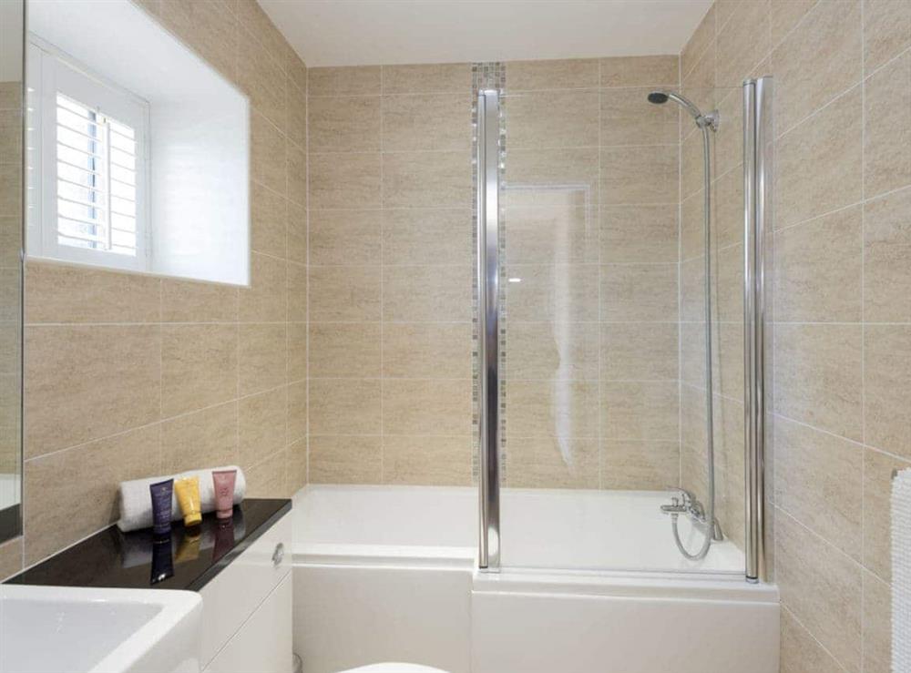 Bathroom with shower over bath at Property 2, 