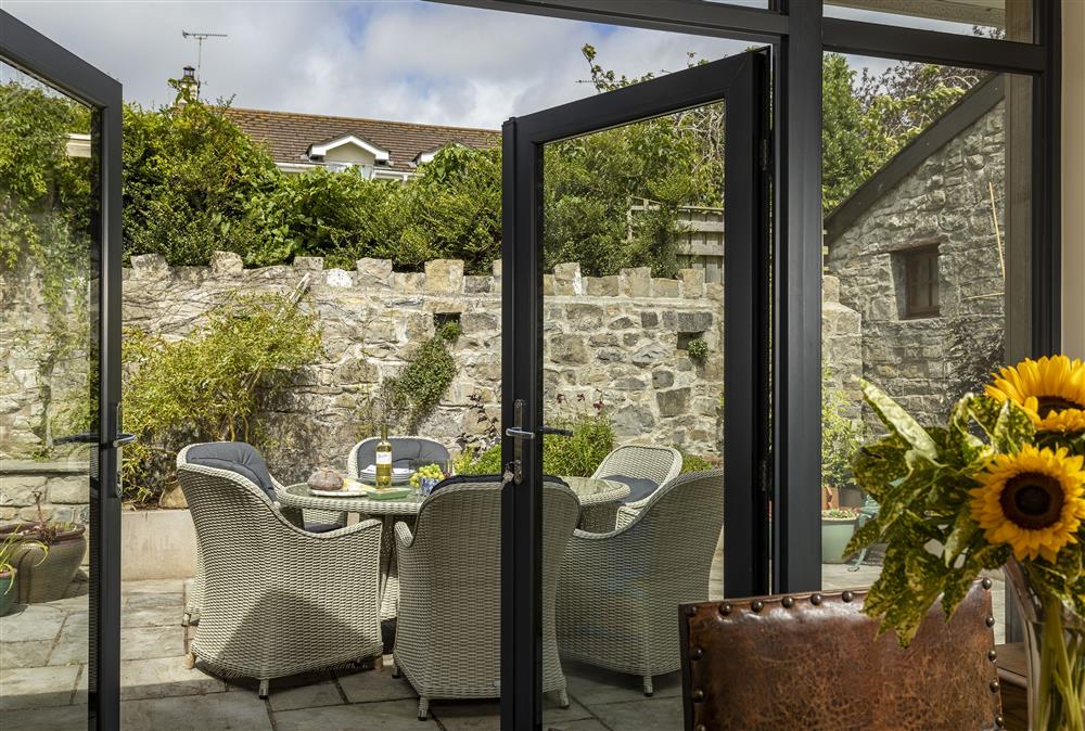 Double doors leading out onto the beautiful courtyard garden at Rexton House, Llantwit Major