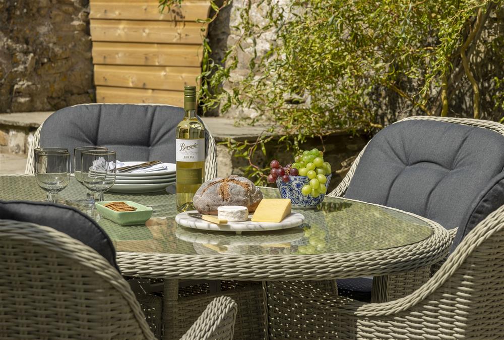 Enjoy al-fresco dining on the comfortable garden furniture  at Rexton House, Llantwit Major