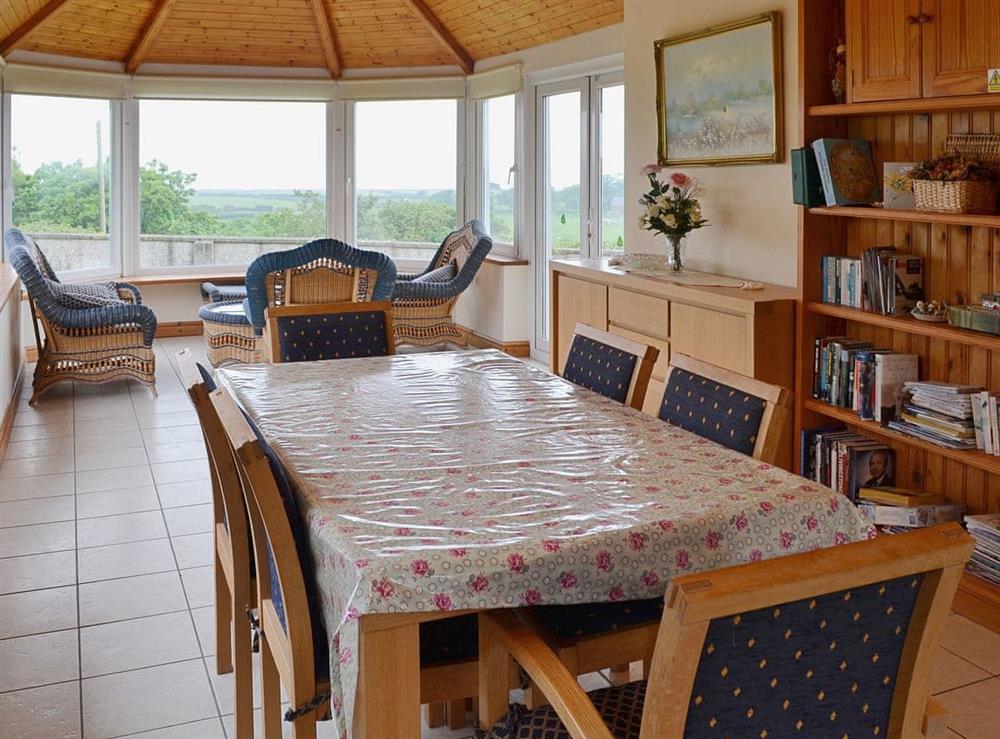 Dining room with conservatory area at Rhandir-Mwyn in Caernarfon, Gwynedd