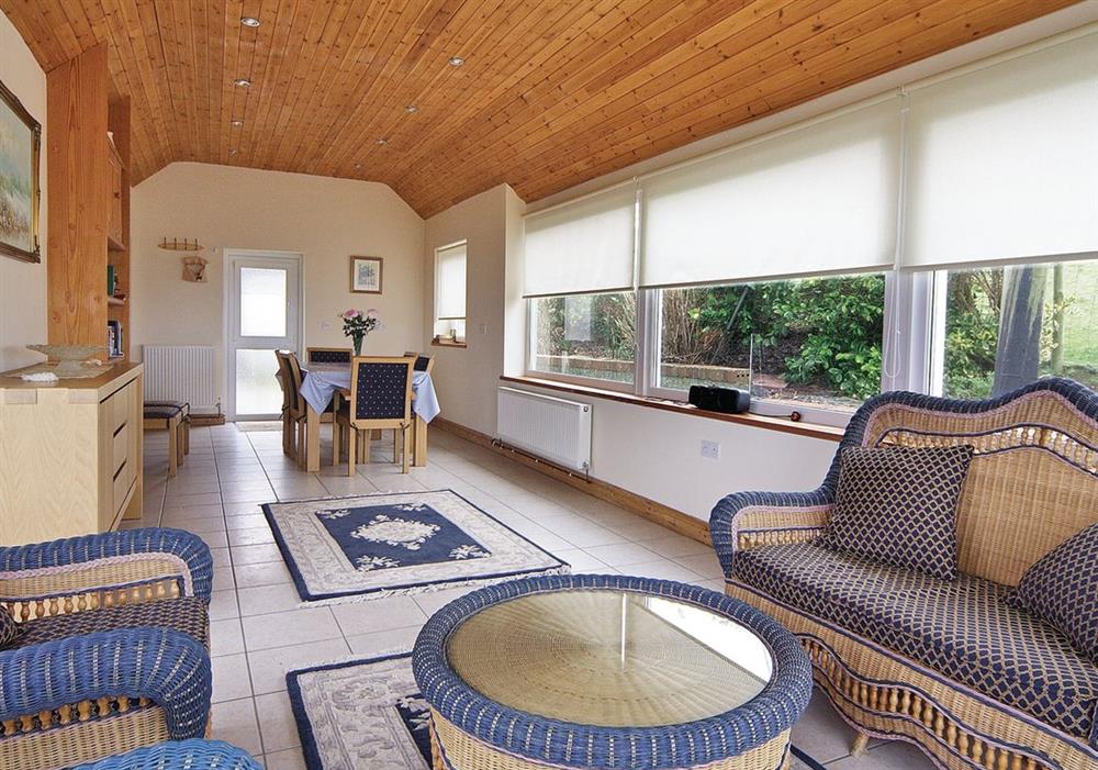 Rhandir-Mwyn conservatory/dining room at Rhandir-Mwyn in Caernarfon, Gwynedd