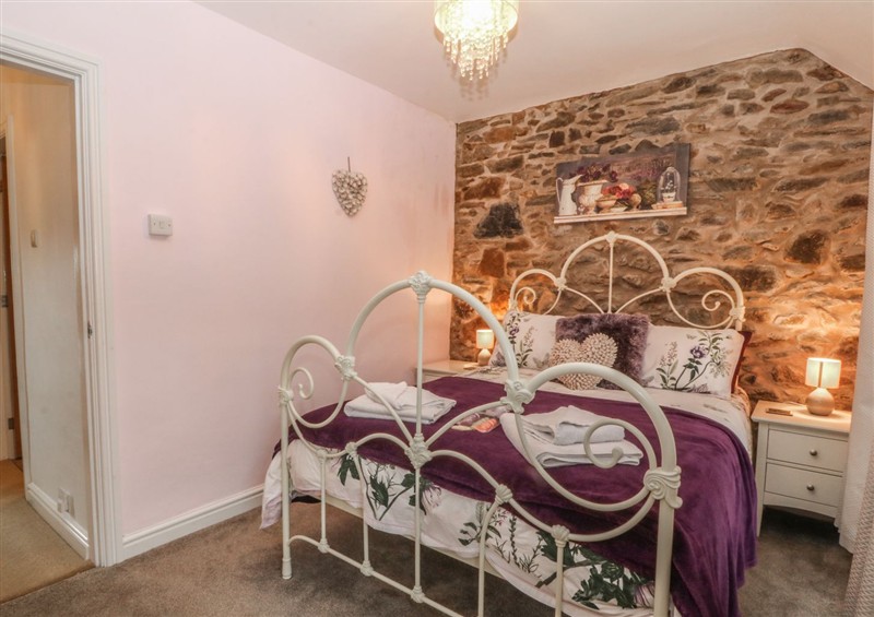 A bedroom in Rhianfa at Rhianfa, Newborough