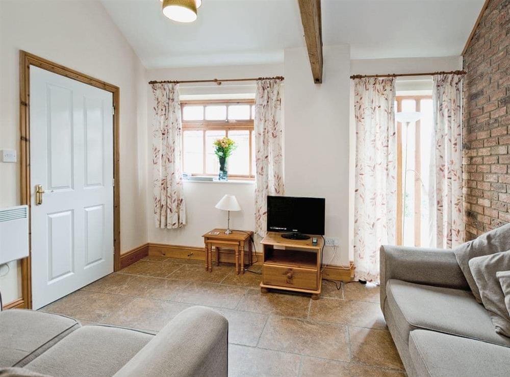 Open plan living/dining room/kitchen at Rhodes Cottage in Filey, North Yorkshire