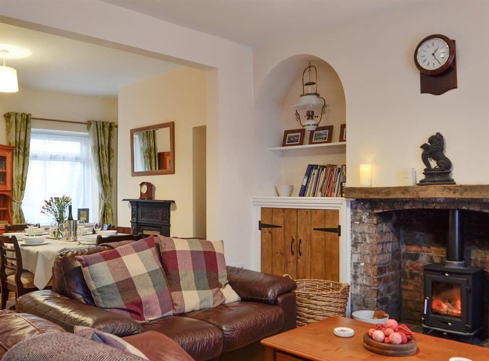 Spacious living and dining room at Rhonas Cottage in Abergavenny, Gwent