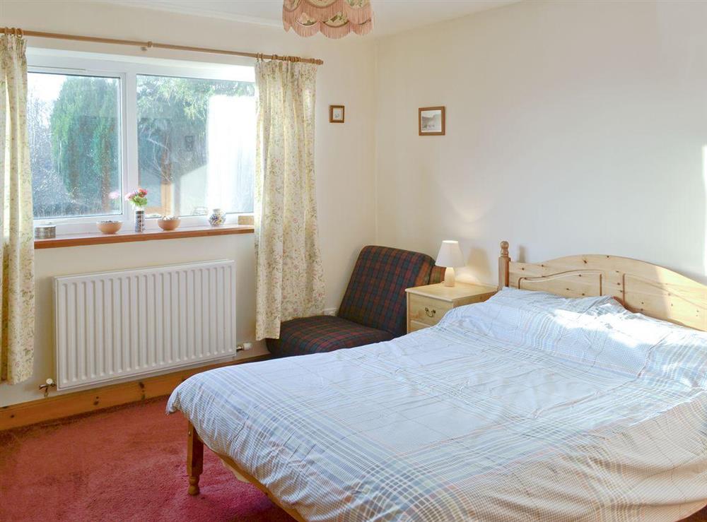 Comfortable master bedroom at Rhonepark Steading in Castle Douglas, Kirkcudbrightshire