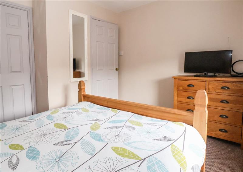This is the bedroom at Rhos Street Retreat, Ruthin
