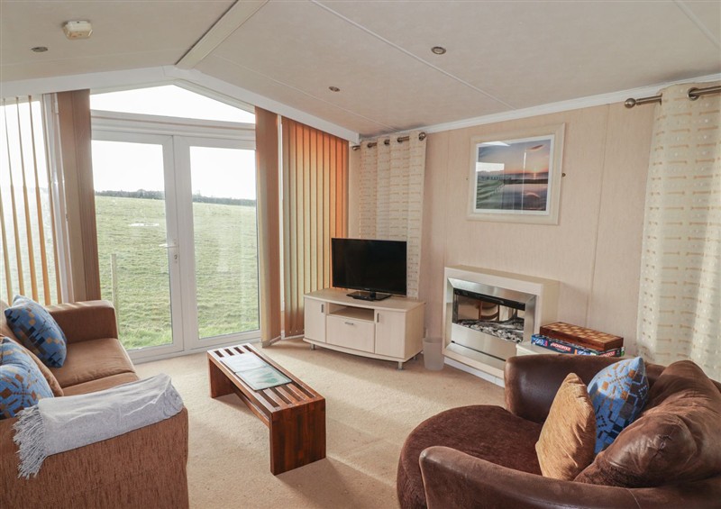 This is the living room at Rhosgranog Caravan, Llandeloy near Solva
