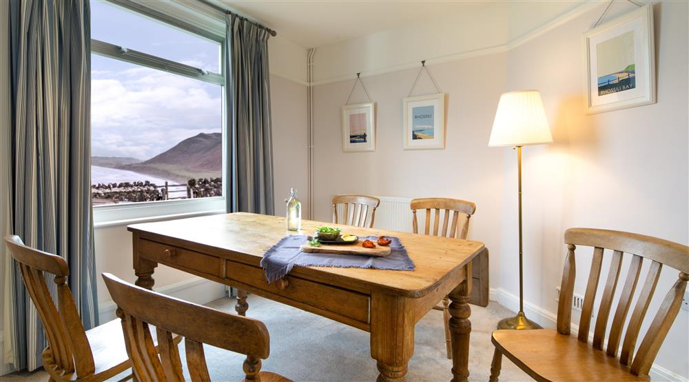 The dining room at Rhossili 1 Coastguard Cottage in Rhossili, South Wales