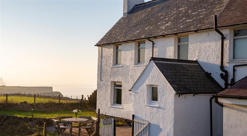 The exterior of 1 Coastguard Cottage, The Gower at Rhossili 1 Coastguard Cottage in Rhossili, South Wales