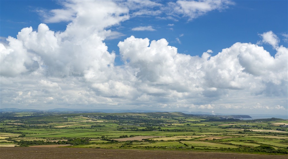 View over Rhossili Down looking east over patchwork fields, South Wales at Rhossili Old Rectory in Rhossili, South Wales