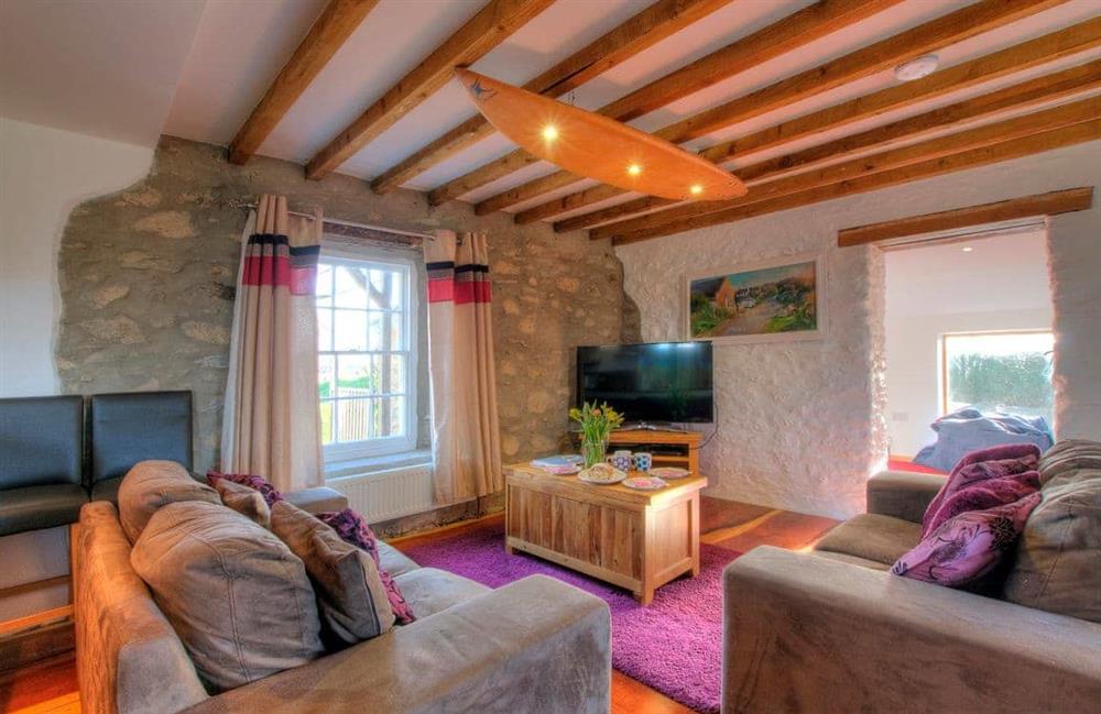 Enjoy the living room at Rhosson Chapel Cottage in St Justinians, Pembrokeshire, Dyfed