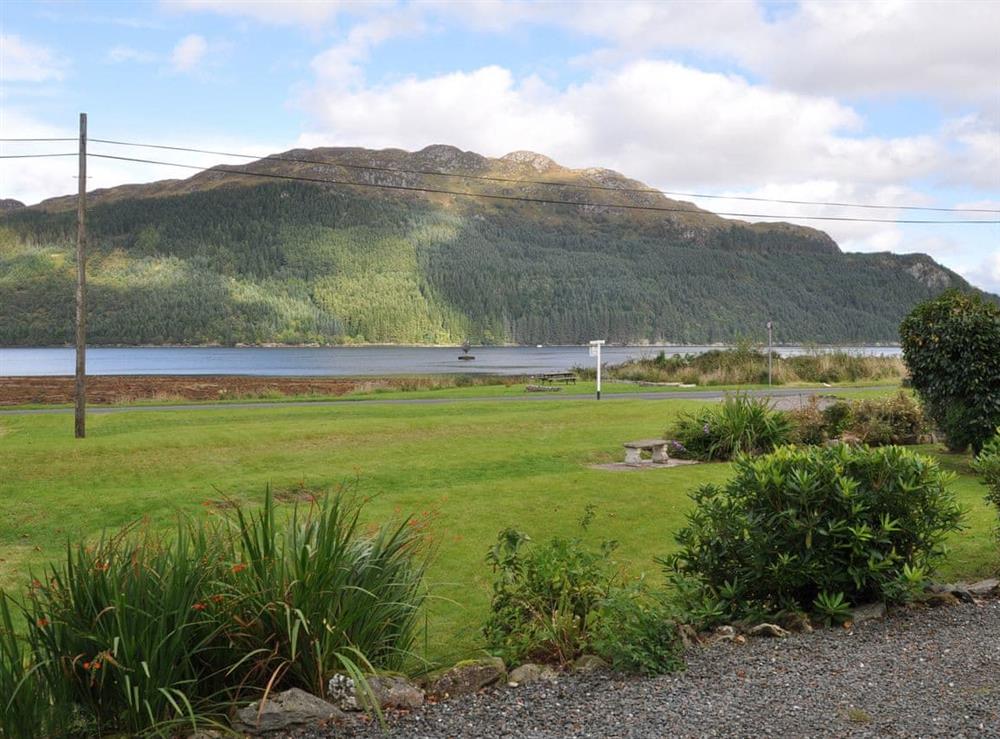 Picturesque view over the front garden at Rhumhor House in Carrick Castle, near Lochgoilhead, Argyll