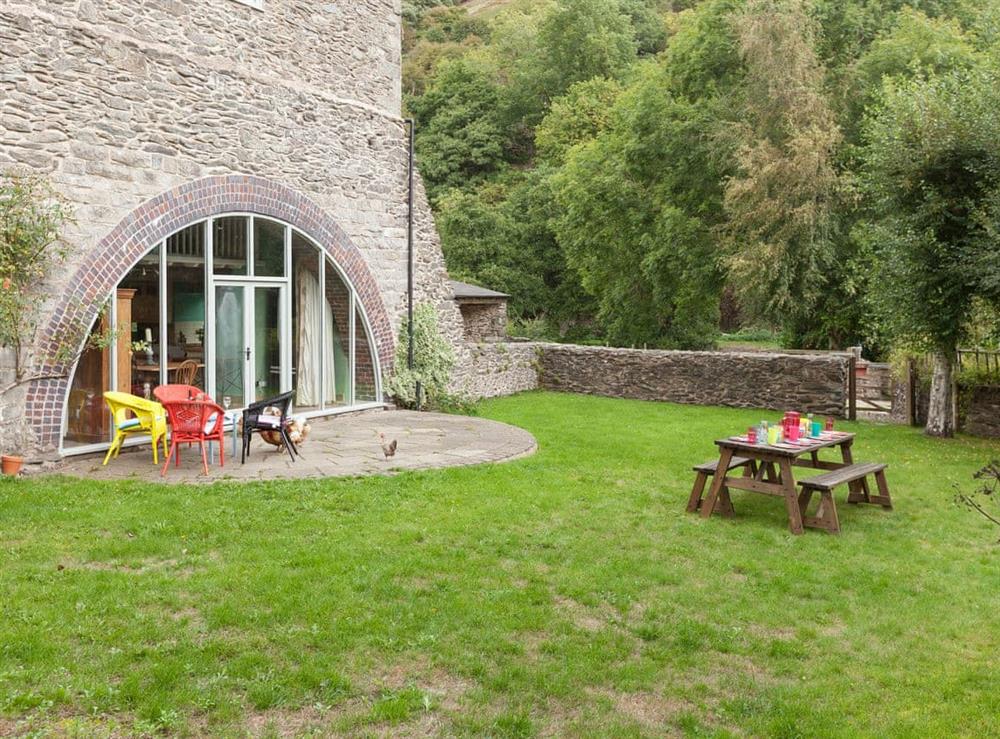 Lawned garden area at Rhydloes Mill in Llansilin, near Oswestry, Powys