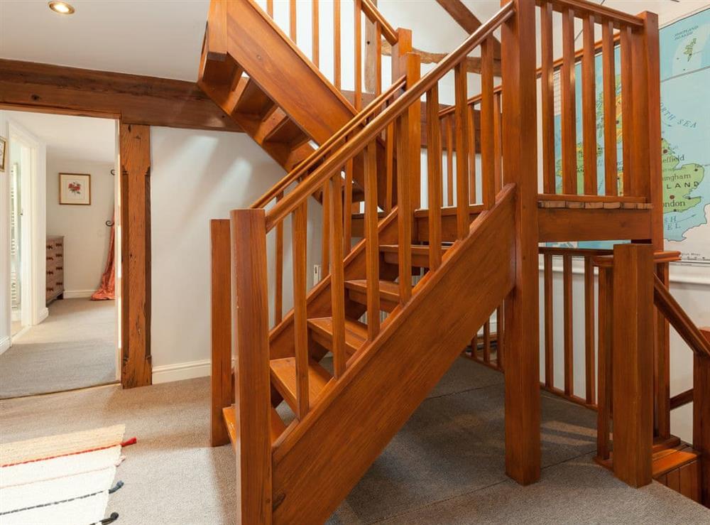 Stairs to third floor bedrooms at Rhydloes Mill in Llansilin, near Oswestry, Powys