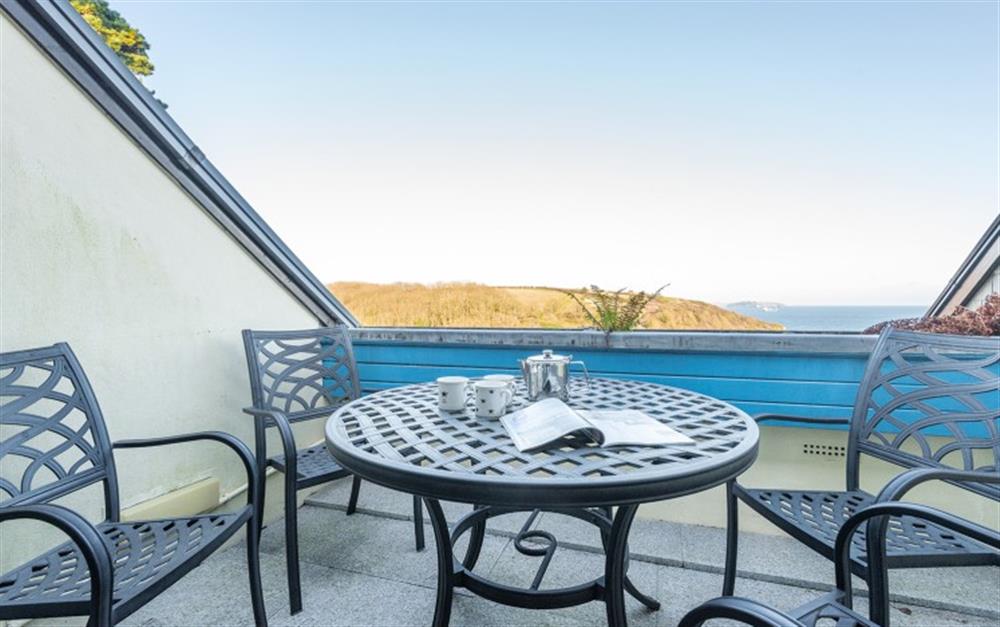 The balcony off of the lounge offers wonderful views across the bay. at Ridges 4 in Maenporth
