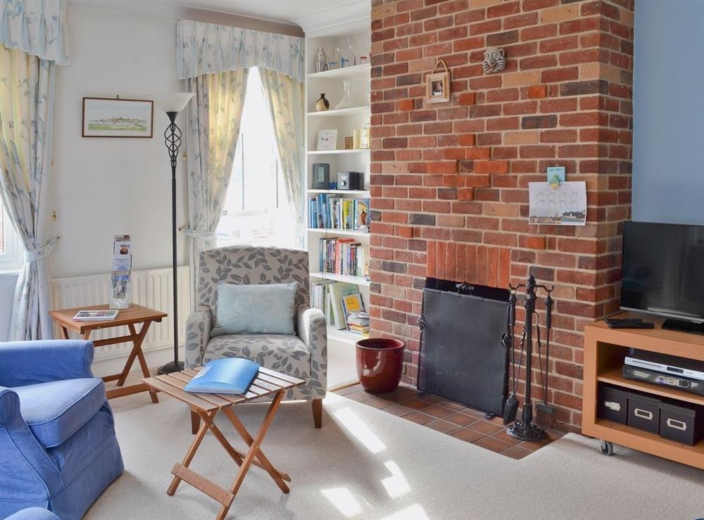 Living room at Riggers Cottage in Bosham, West Sussex