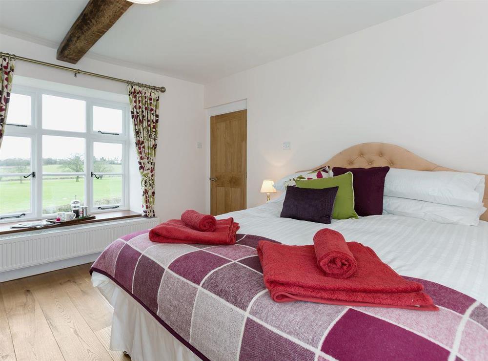 Double bedroom full of character at Rimmers Farmhouse in Wichenford, near Worcester, Worcestershire