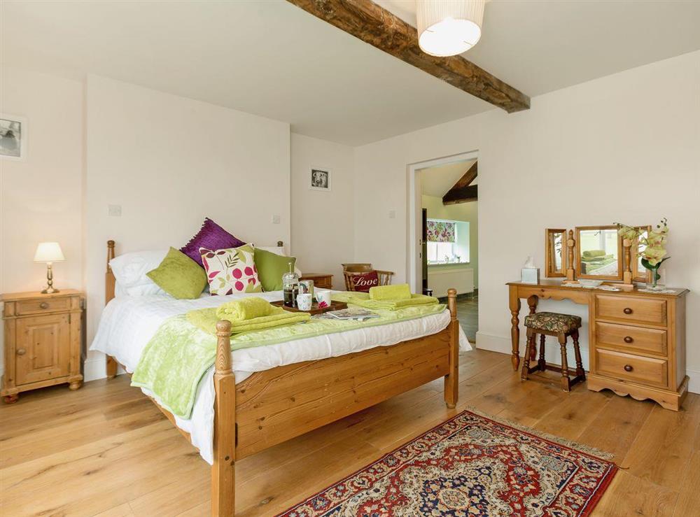 Elegant double bedroom at Rimmers Farmhouse in Wichenford, near Worcester, Worcestershire