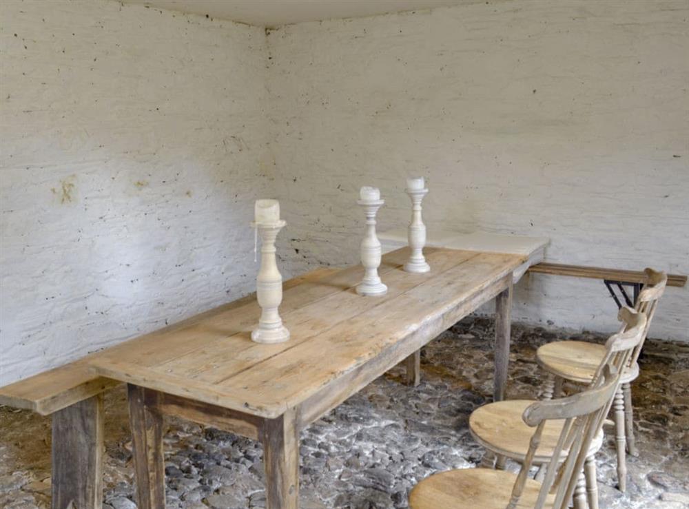 Additional dining/seating area adjoins courtyard at Ringslade Barn in Highweek, near Newton Abbot, Devon