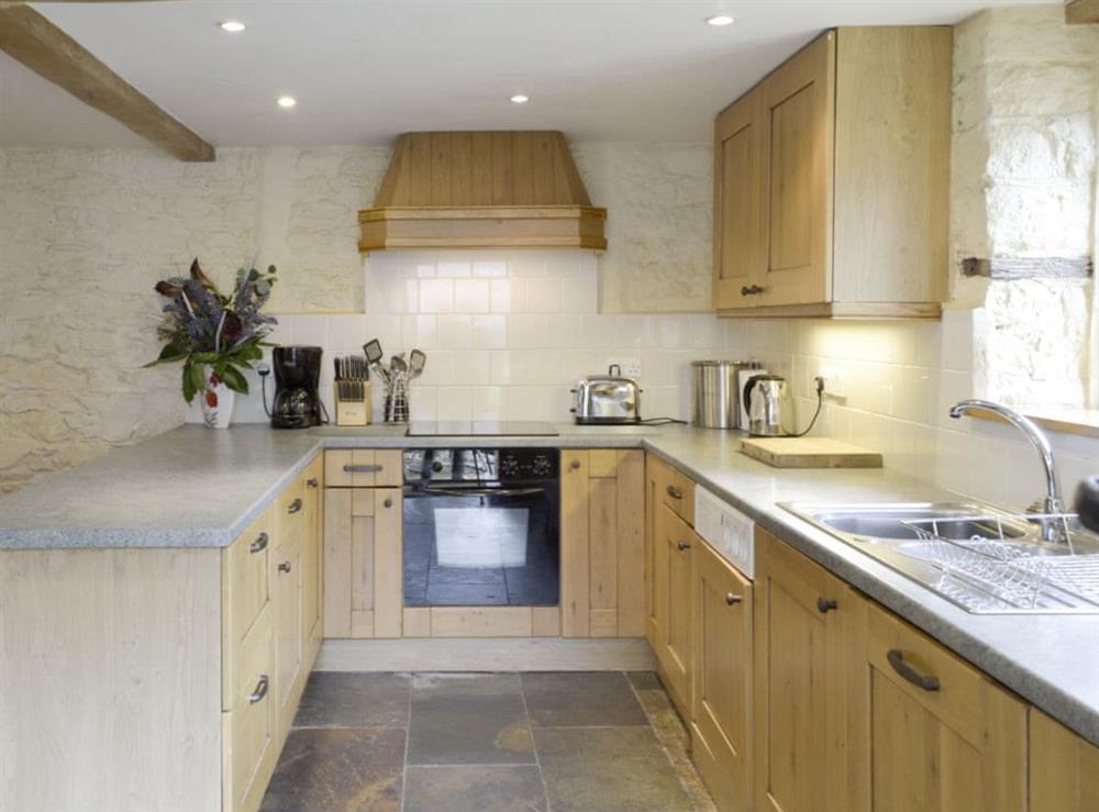 Well-equipped fitted kitchen at Ringslade Barn in Highweek, near Newton Abbot, Devon