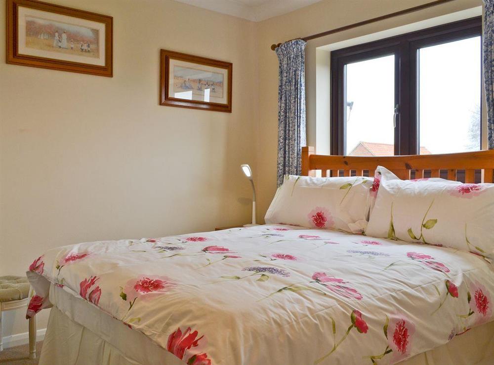 Double bedroom at Ringstead Cottage in Ringstead, Norfolk