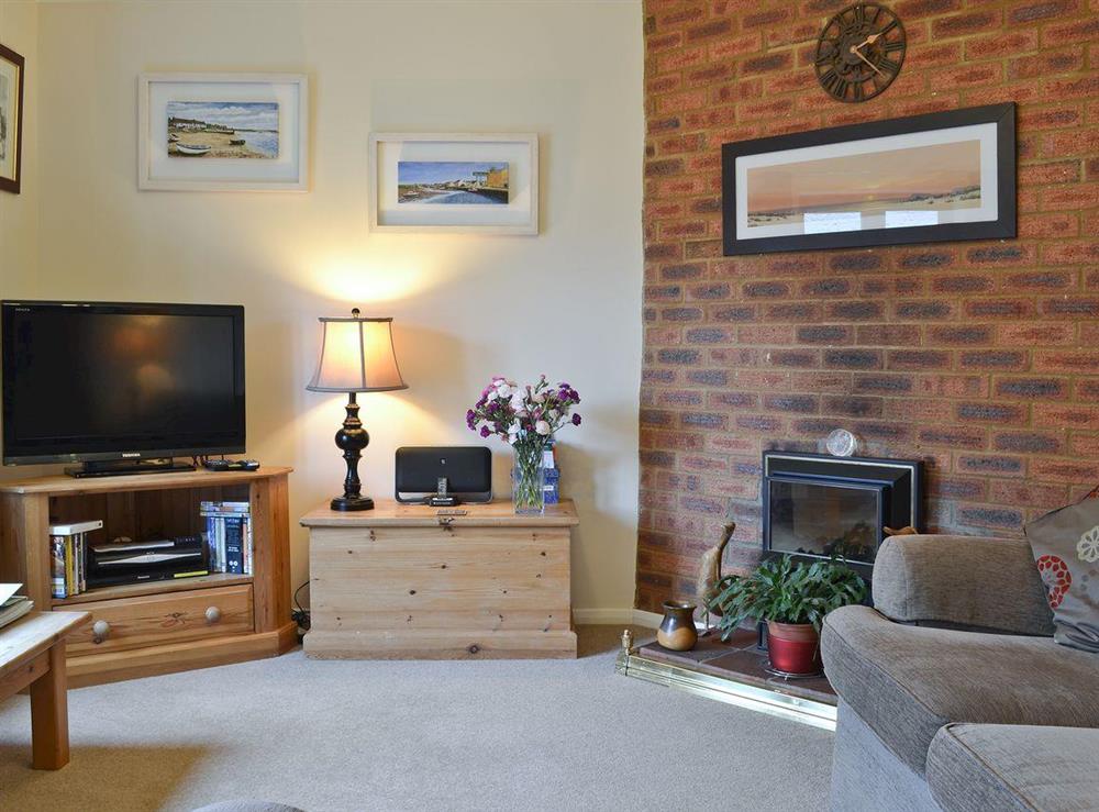 Living room at Ringstead Cottage in Ringstead, Norfolk