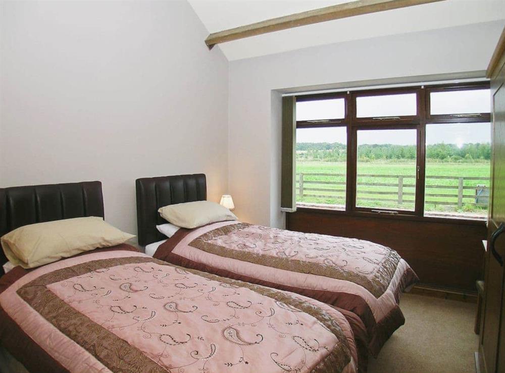 Twin bedroom at Rising Sun Cottage in Aldwark, near Tollerton, North Yorkshire