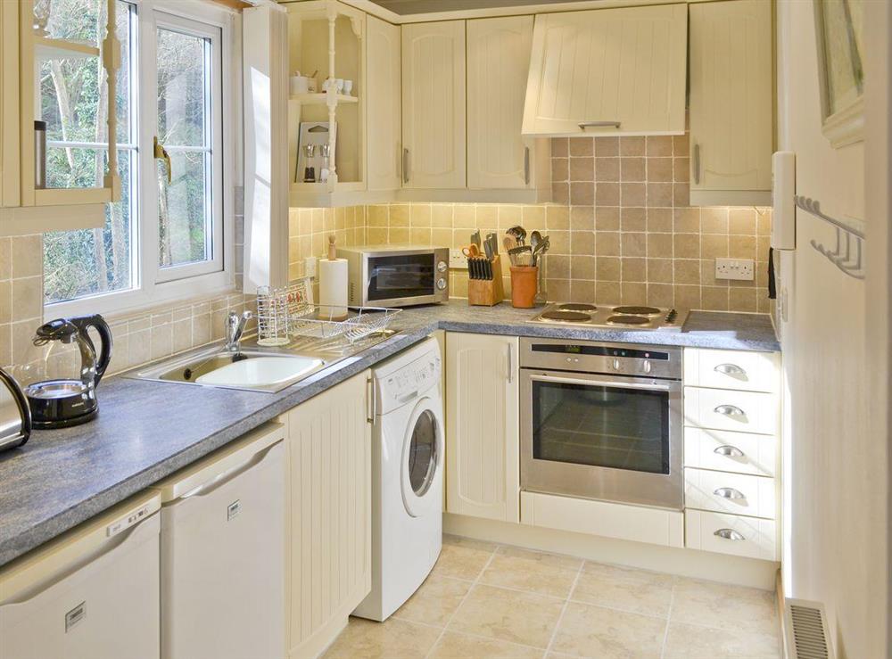 Well-equipped fitted kitchen at River Lodge in Polperro, near Looe, Cornwall