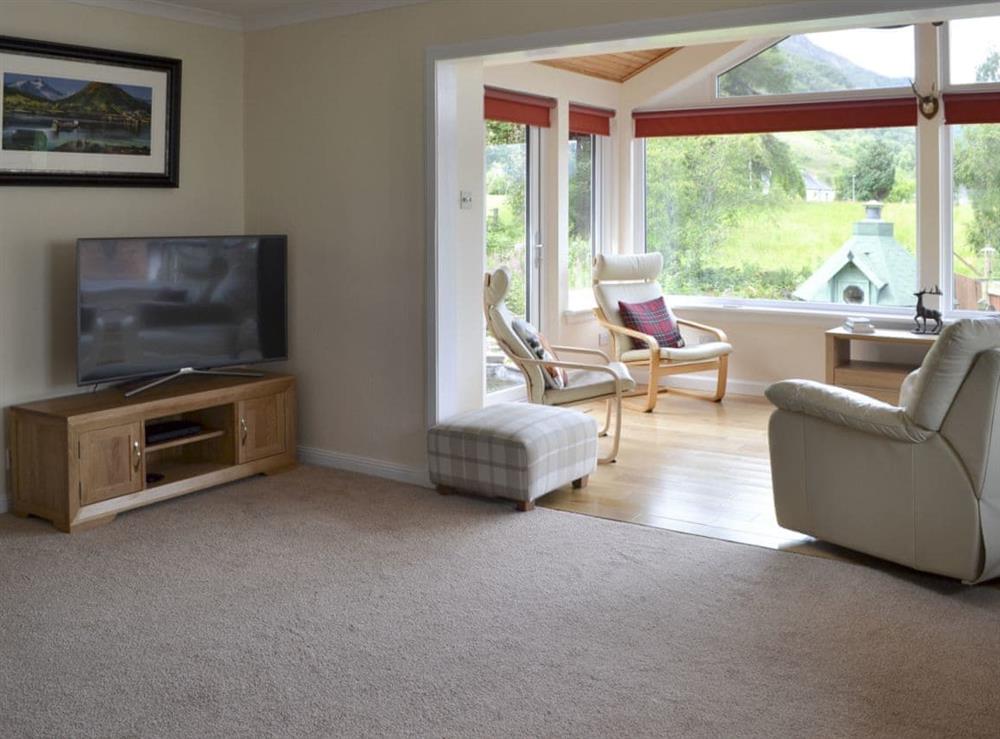 Relaxing lounge with Sky Smart TV at River Mill House in Ballachulish, near Fort William, Argyll