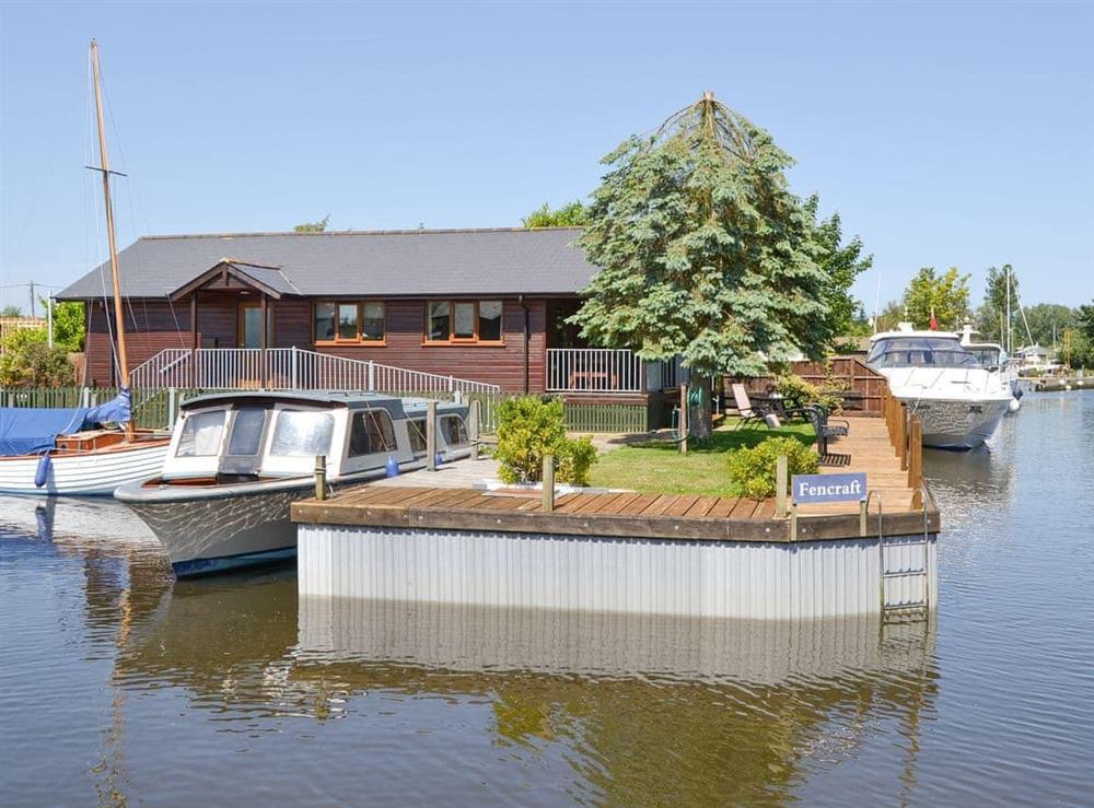 Lovely holiday lodge with private quay headed mooring for a motor launch at River Rest in Brundall, Norfolk