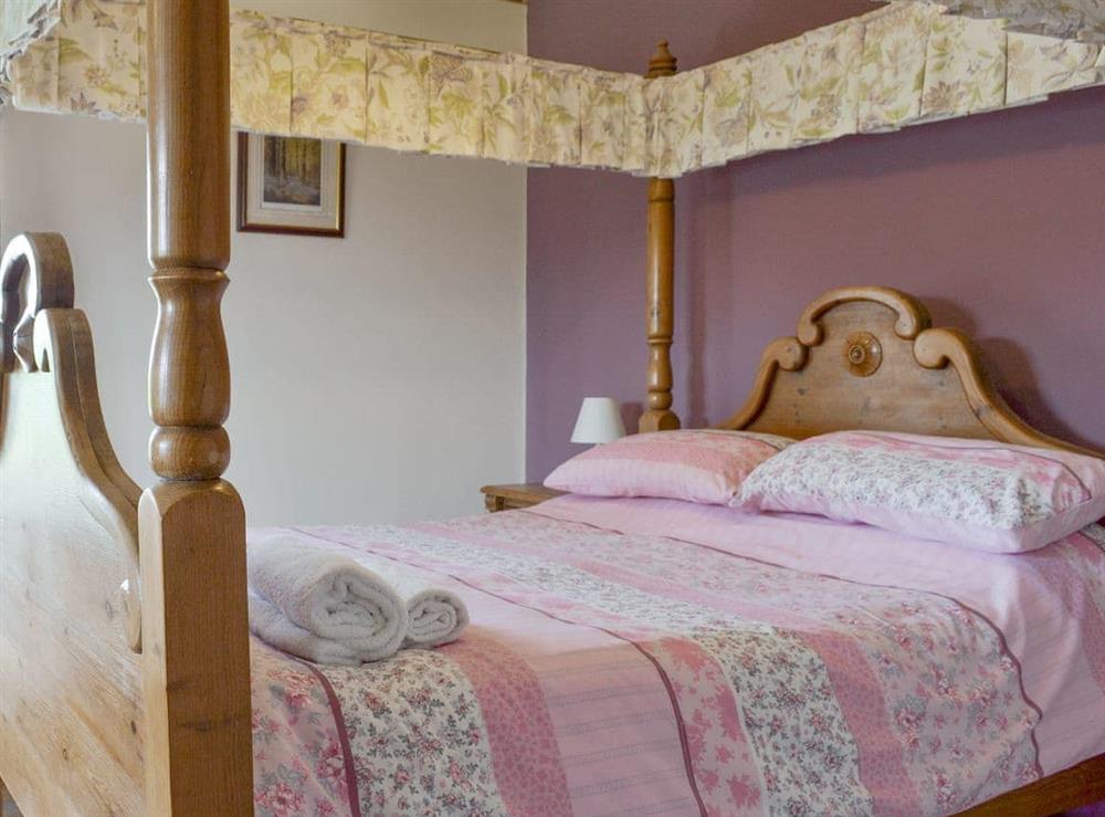Comfortable four poster bedroom at River View in Brandesburton, Nr Bridlington, East Yorkshire., North Humberside