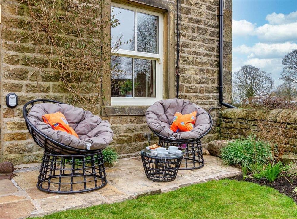 Front garden seating at River View Cottage in Gargrave, near Skipton, Yorkshire, North Yorkshire