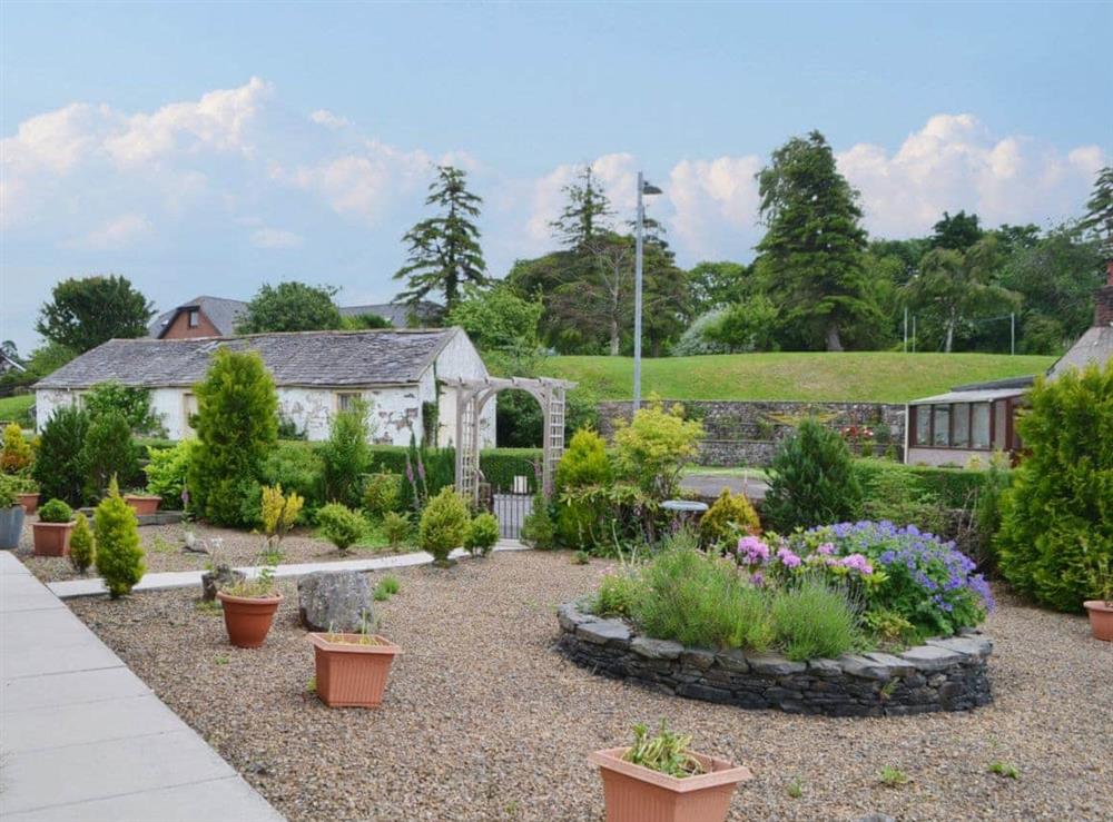 Mainly gravelled front garden at Riverside in Brydekirk, Annon, Dumfriesshire