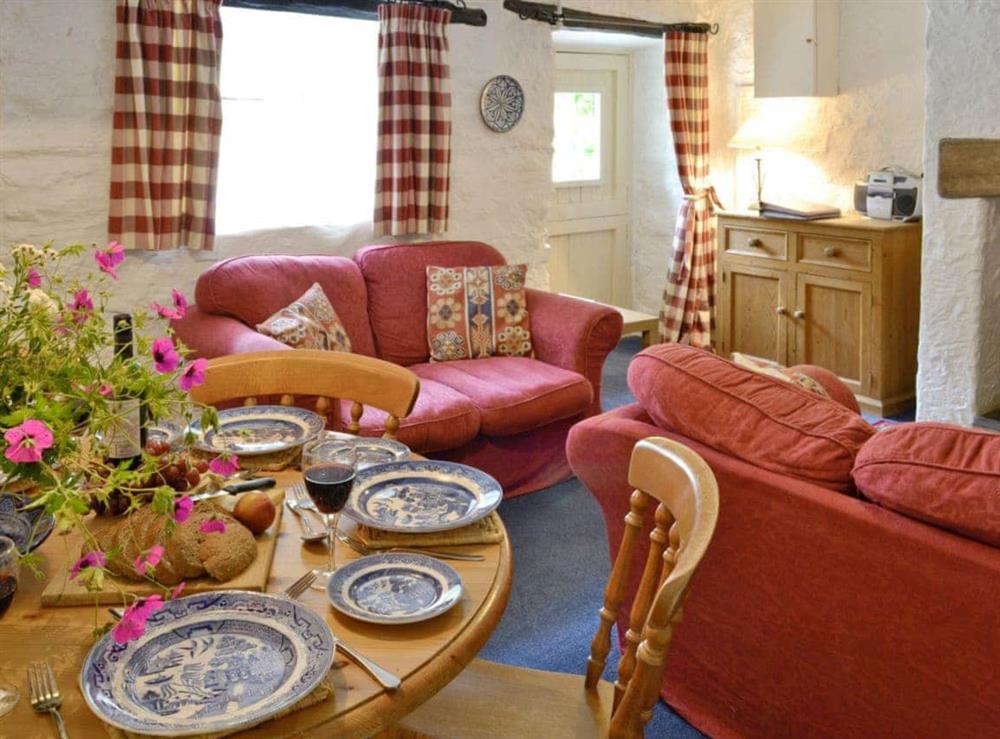 Appealing living/dining room at Riverside Cottage in Betws-y-Coed, Gwynedd