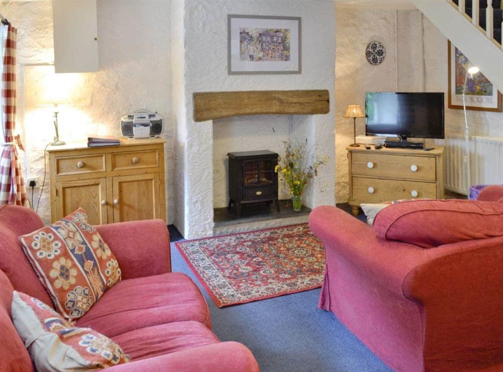 Welcoming living room at Riverside Cottage in Betws-y-Coed, Gwynedd