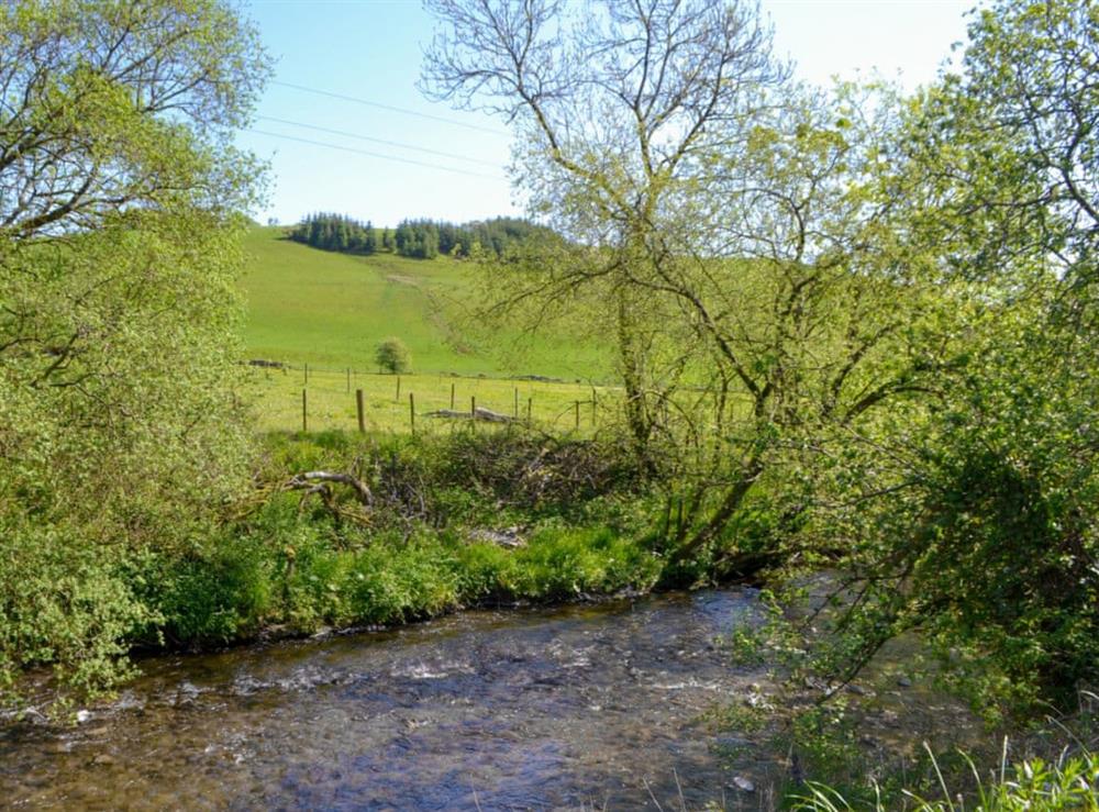 River Dryfe at Riverside Cottage in Boreland, near Lockerbie, Dumfries and Galloway, Dumfriesshire