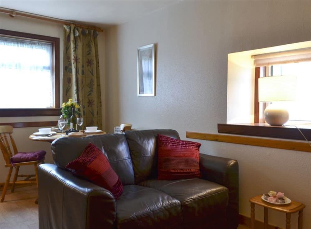 Living and dining room at Riverside Cottage in Drumnadrochit, near Loch Ness, Highlands, Inverness-Shire