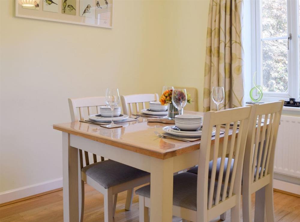 Charming dining area at Riverside Cottage in Evesham, Worcestershire, England
