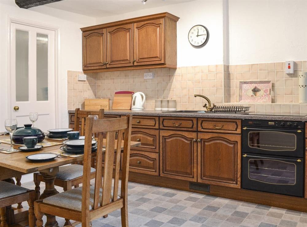 Kitchen with dining area at Riverside Cottage in Low Nibthwaite, near Ulverston, Derbyshire