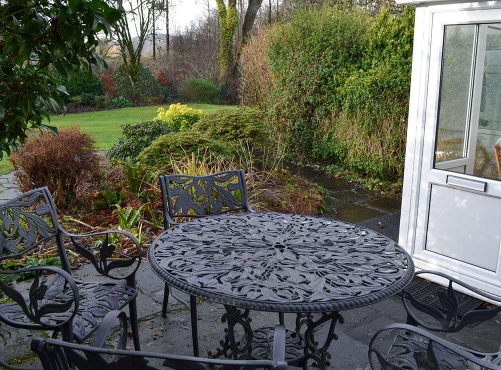 Sitting out area at Riverside Cottage in Low Nibthwaite, near Ulverston, Derbyshire