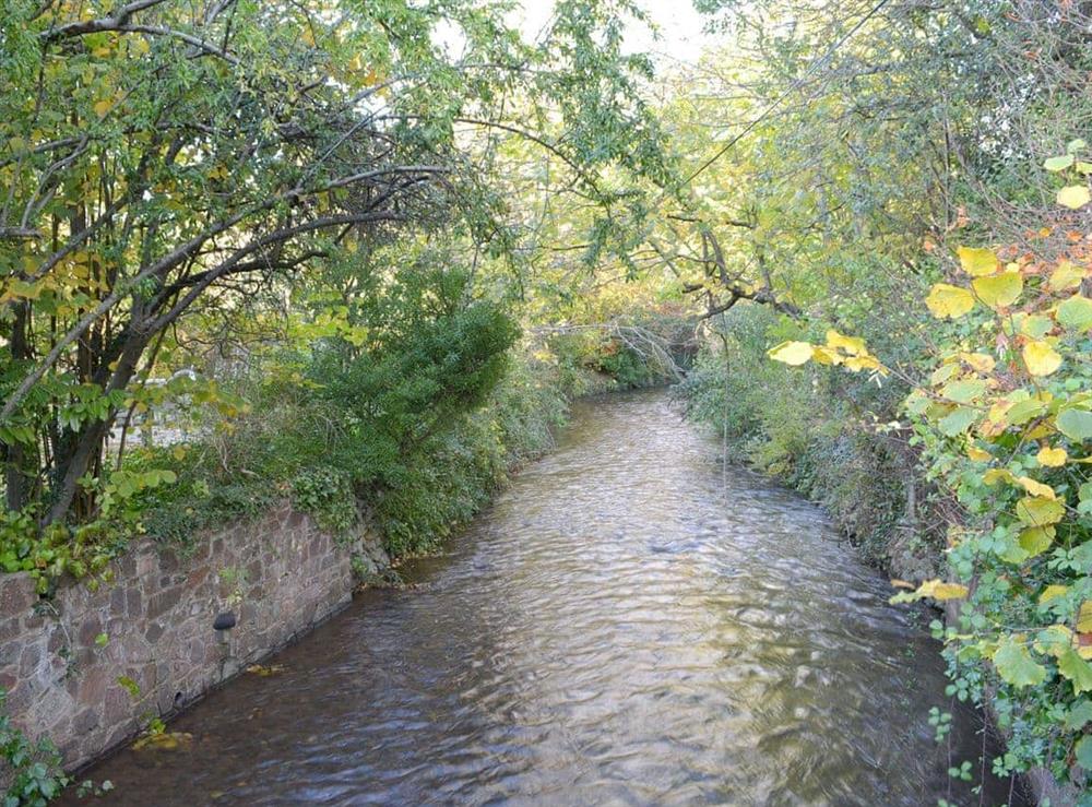 The peaceful river running at Riverside Cottage in Lower Washford, near Watchet, Somerset