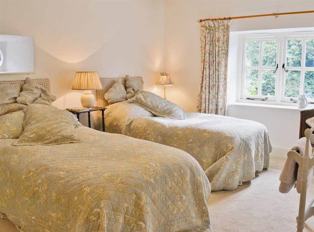 Twin bedroom at Riverside Cottage in Lower Washford, near Watchet, Somerset
