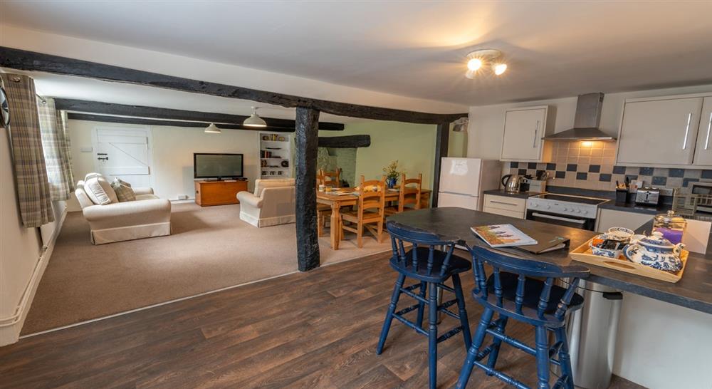 The open plan kitchen, diner and sitting room at Riverside Cottage in Lynton, North Devon