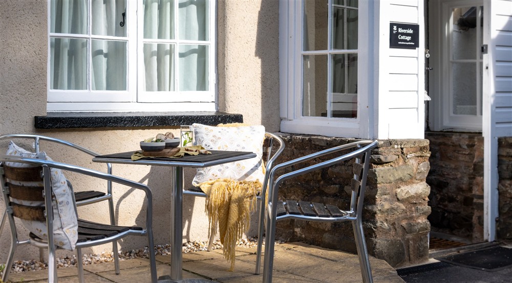 The outdoor seating area at Riverside Cottage in Lynton, North Devon