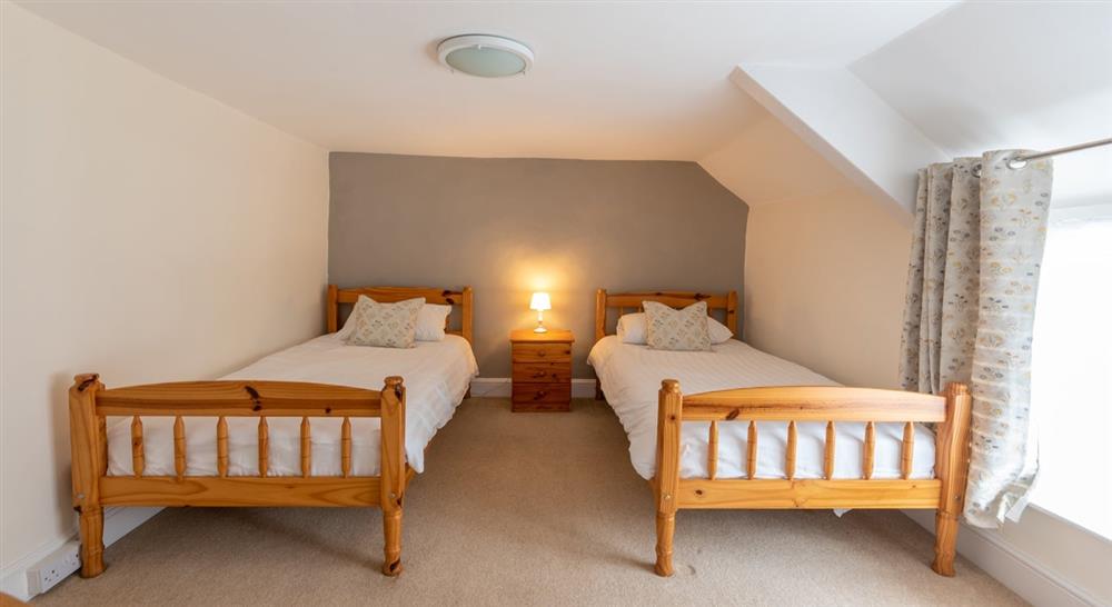 The twin bedroom at Riverside Cottage in Lynton, North Devon