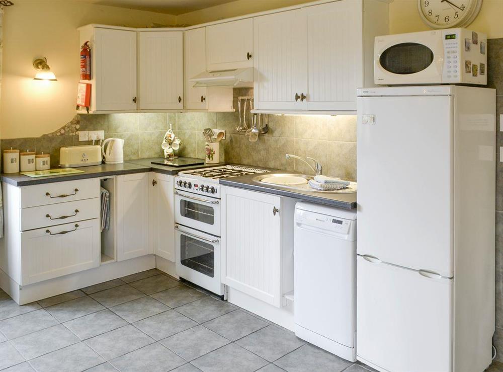 Well-equipped fitted kitchen at Riverside Cottage in Old Costessey, Norfolk., Great Britain
