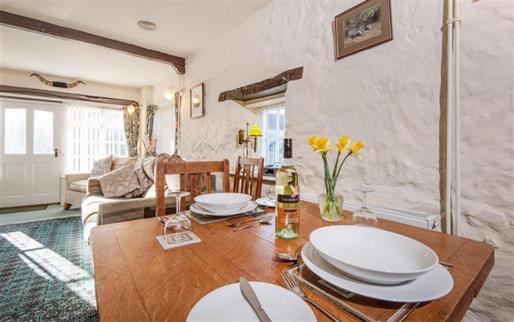The dining table and chairs at Riverside Cottage in Seaton