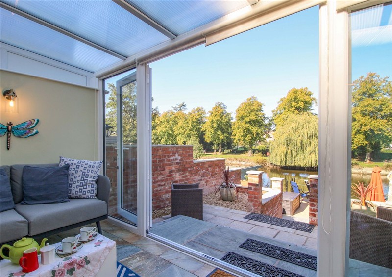 Enjoy a cup of tea on the patio at Riverside Cottage, Shrewsbury