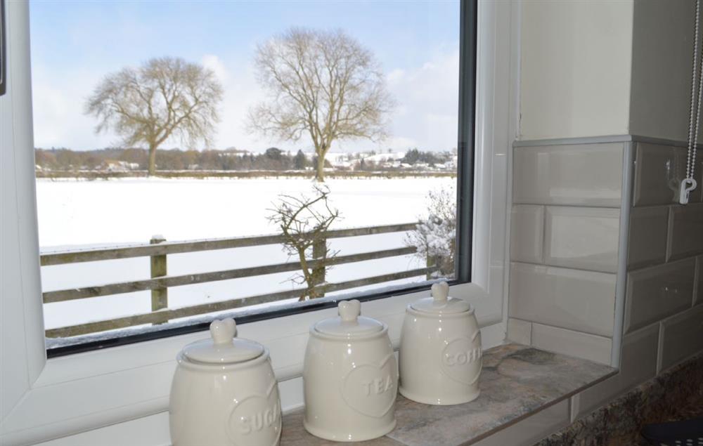A view from the kitchen to open countryside at Riverside Farm Cottage, Kirby Mills, Kirkbymoorside
